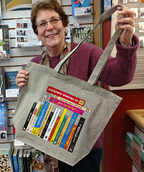 Sally with an Independent Bookstore Day tote bag