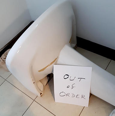 Prone sink with Out of Order sign
