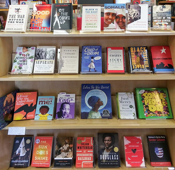 Display of books about race in America
