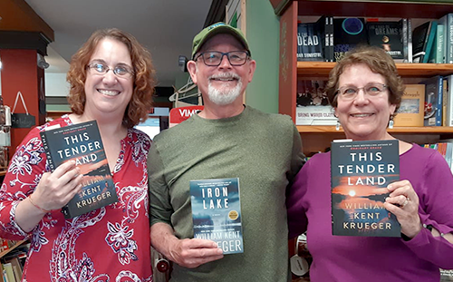 Jen, William Kent Krueger, and Sally holding his books